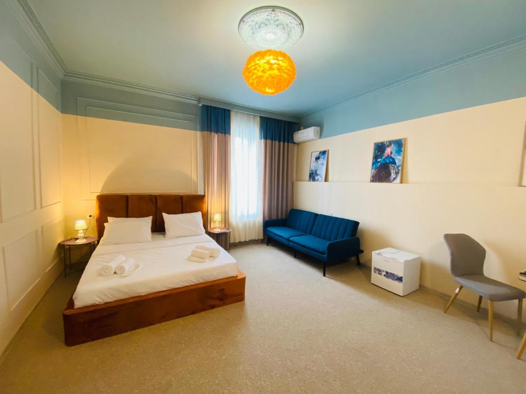 Postel nebo postele na pokoji v ubytování Mose art Hotel