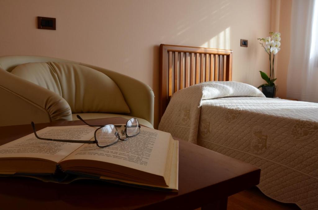 Postel nebo postele na pokoji v ubytování B&B La Palanca