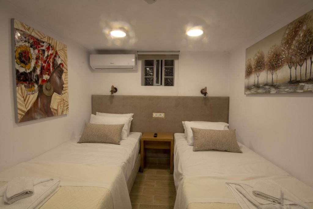 Łóżko lub łóżka w pokoju w obiekcie Casa Christina-Luxury Villa