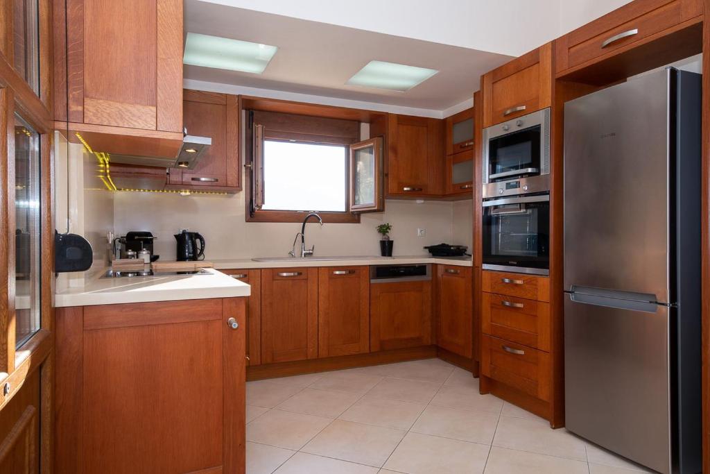 Kuchyňa alebo kuchynka v ubytovaní Vitamin Sea Luxury Villas