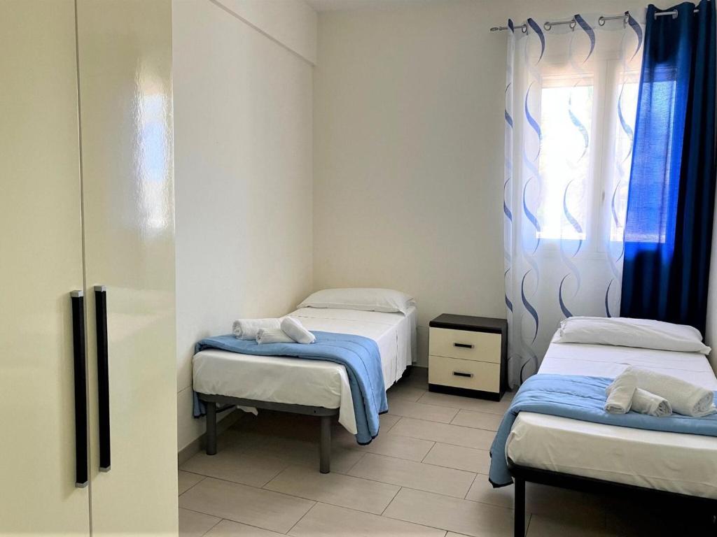 Posteľ alebo postele v izbe v ubytovaní Belvilla by Oyo Holiday home in ispica