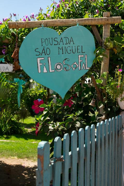 a sign that reads pussada san miguel fiesta at Pousada São Miguel Filosofal in São Miguel do Gostoso