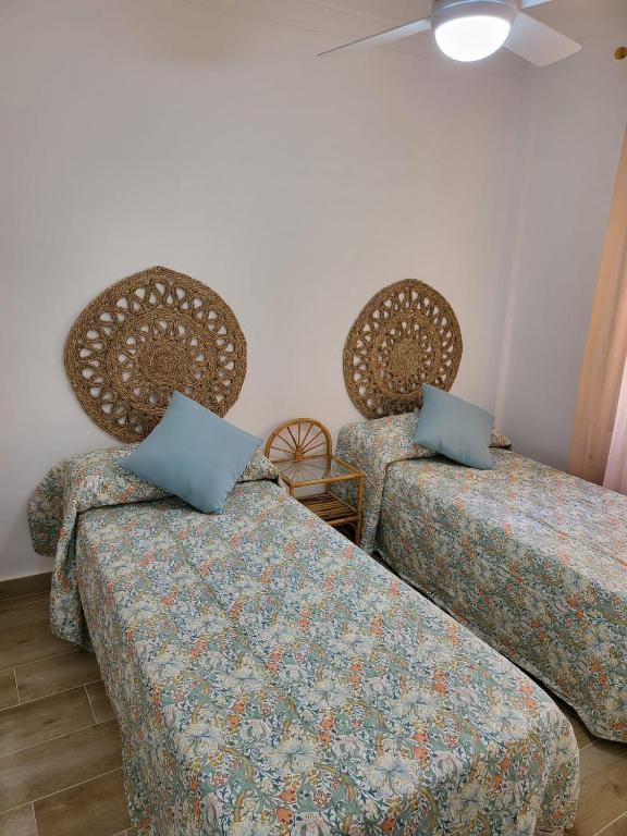 Posteľ alebo postele v izbe v ubytovaní APARTAMENTO SH