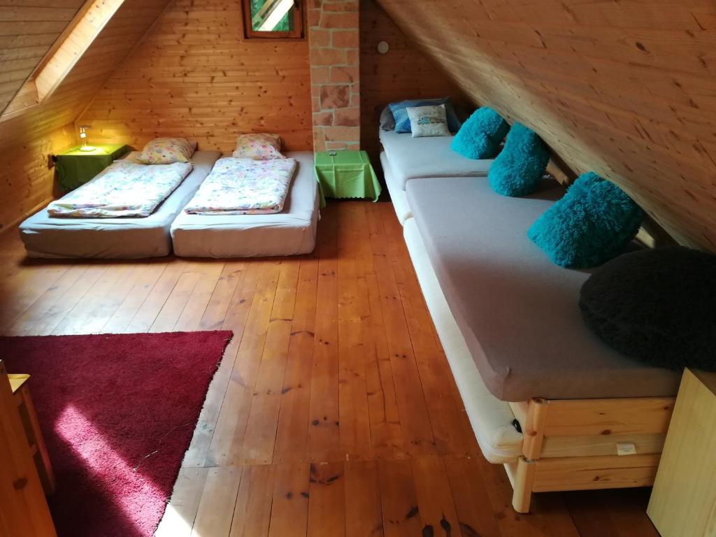 Postel nebo postele na pokoji v ubytování Chata Sport Vysočina