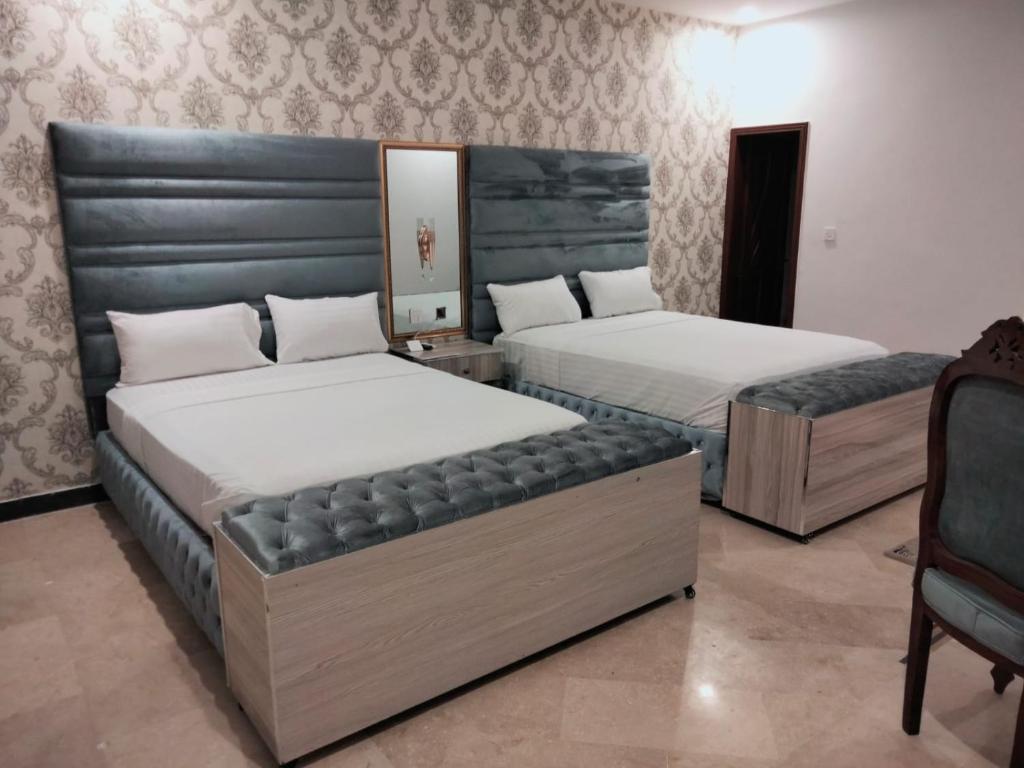 Grand Swiss Hotel&Apartment Lahore - Chambre Jumelle De Luxe