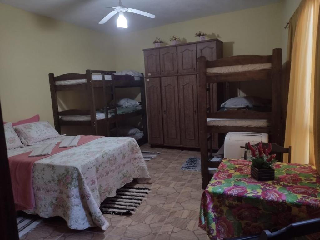 Postel nebo postele na pokoji v ubytování LAR JÔ DENDÊ