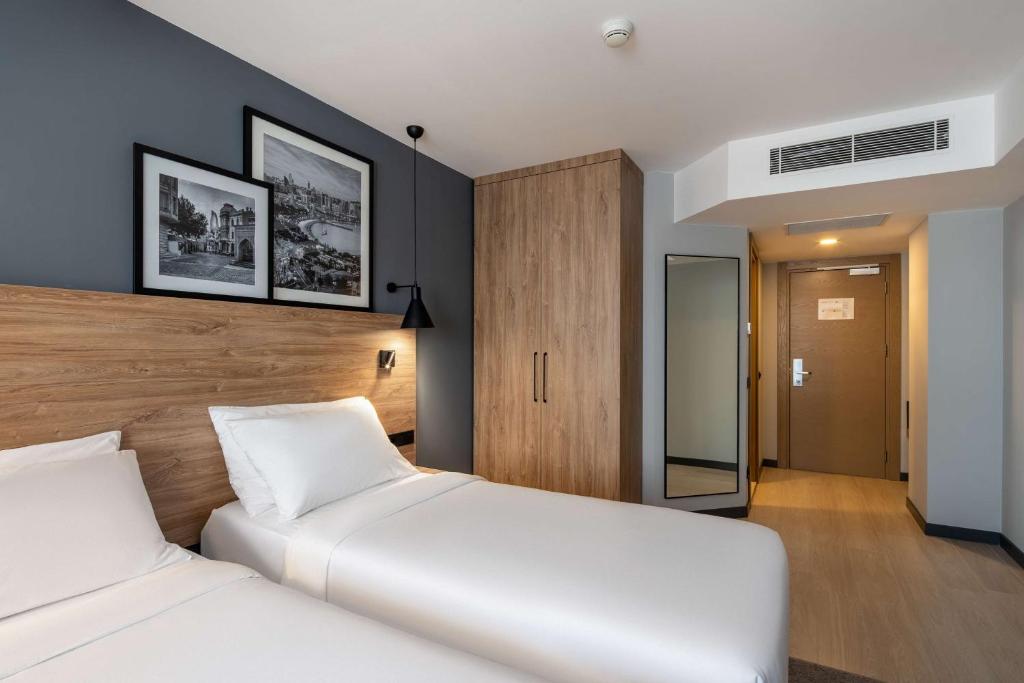 Postel nebo postele na pokoji v ubytování Radisson Hotel Baku