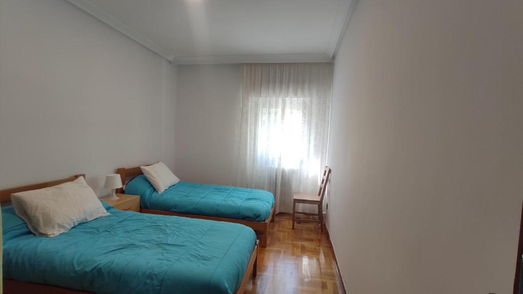 Posteľ alebo postele v izbe v ubytovaní Apartamento Pamplona a 10 minutos del centro