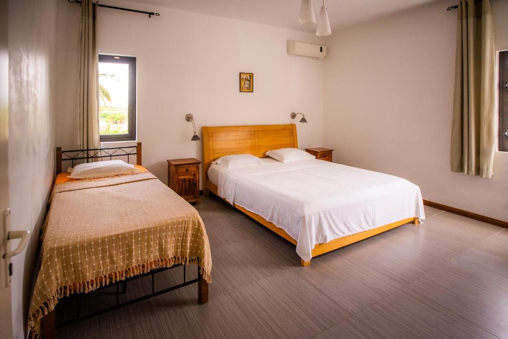 Postel nebo postele na pokoji v ubytování Villa Simone: Sunlit Beach Getaway w/ Pool + WIFI