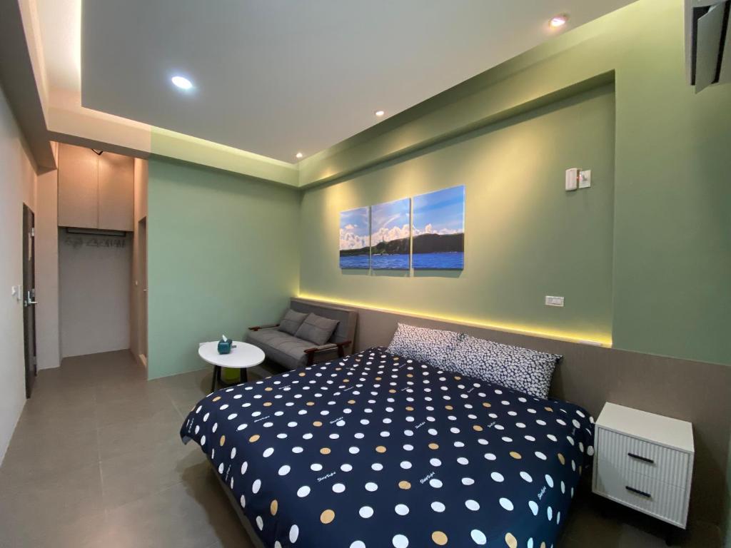 Postel nebo postele na pokoji v ubytování 珊號旅店 3inn