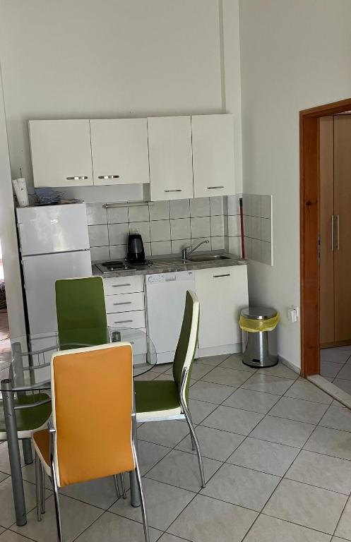 Kuchyň nebo kuchyňský kout v ubytování Apartments Nives