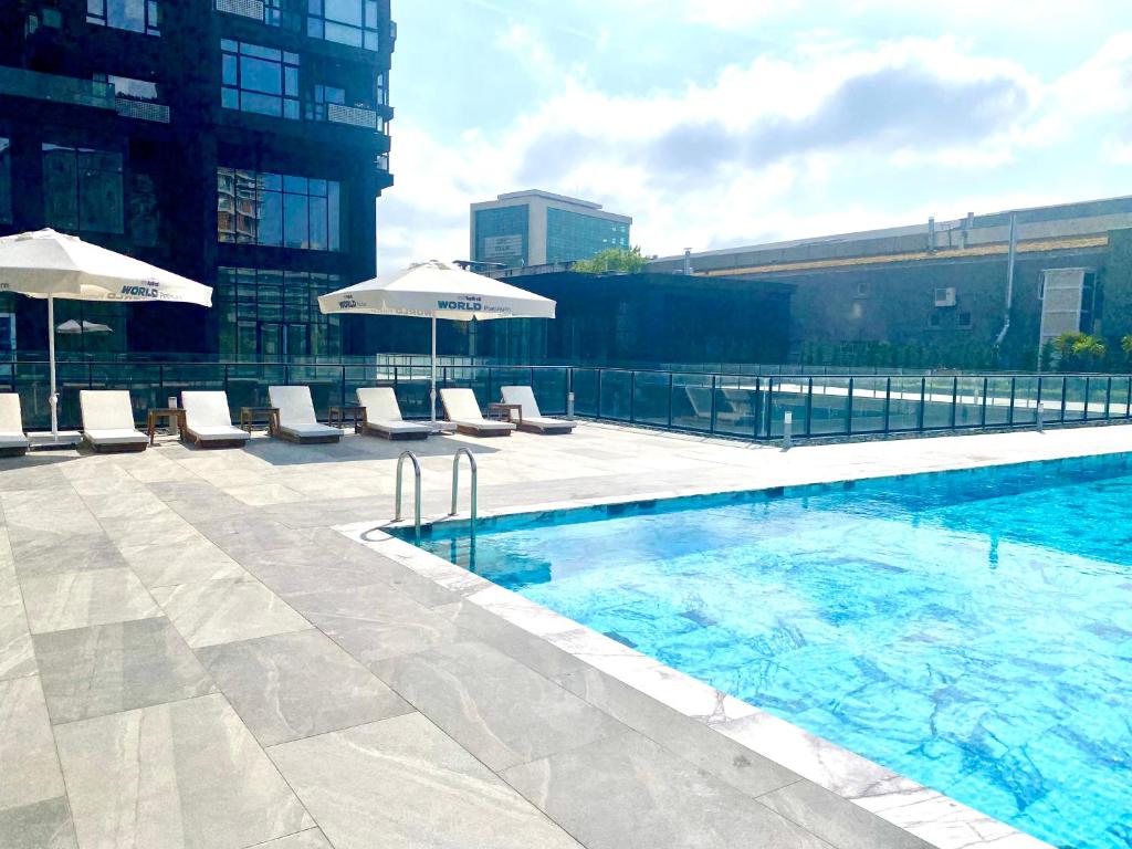 The swimming pool at or close to G Tower Furnished Apartment Rentals