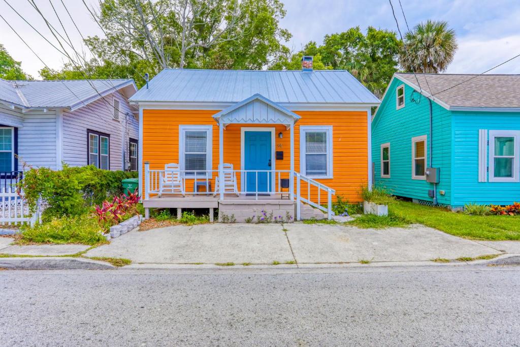 a house with an orange door in a row of houses at Bernard Street Bungalow in St. Augustine