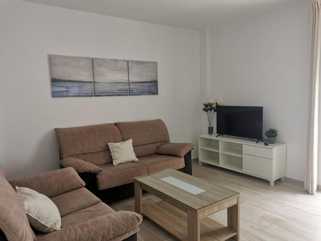 Televízia a/alebo spoločenská miestnosť v ubytovaní Precioso piso céntrico recién reformado