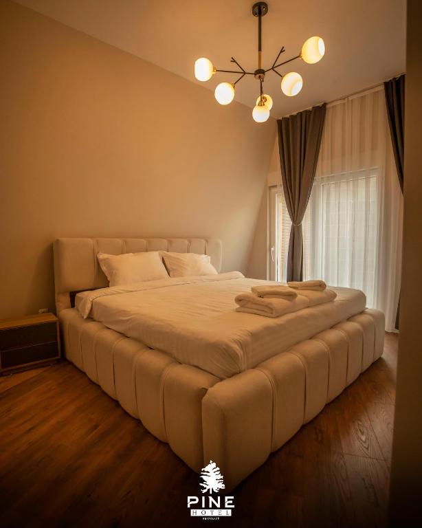 Postel nebo postele na pokoji v ubytování Pine Villas Brezovice