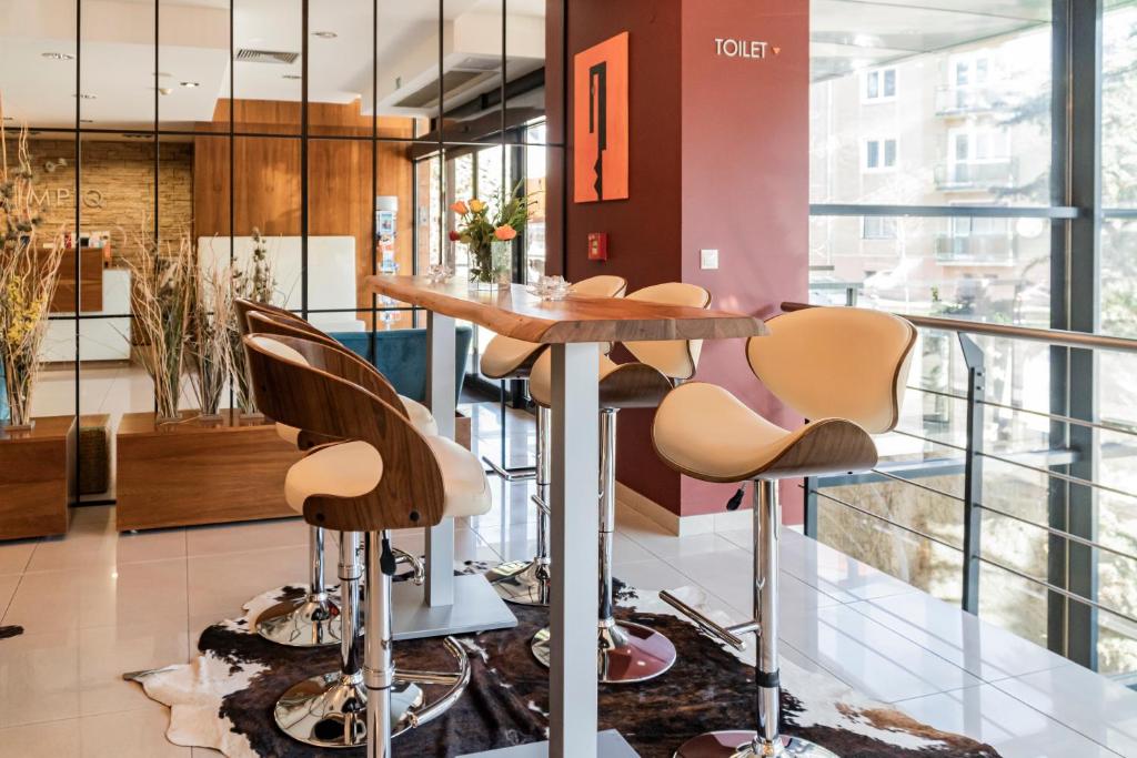 Posedenie v ubytovaní IMPIQ Hotel