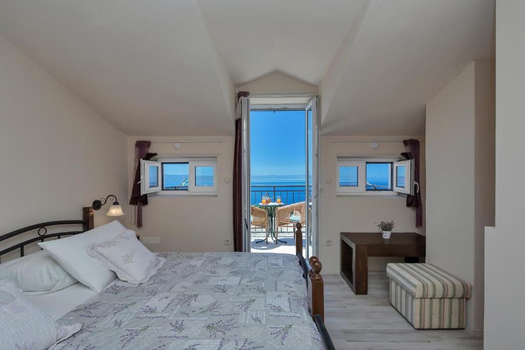 Posteľ alebo postele v izbe v ubytovaní Holiday House Nede