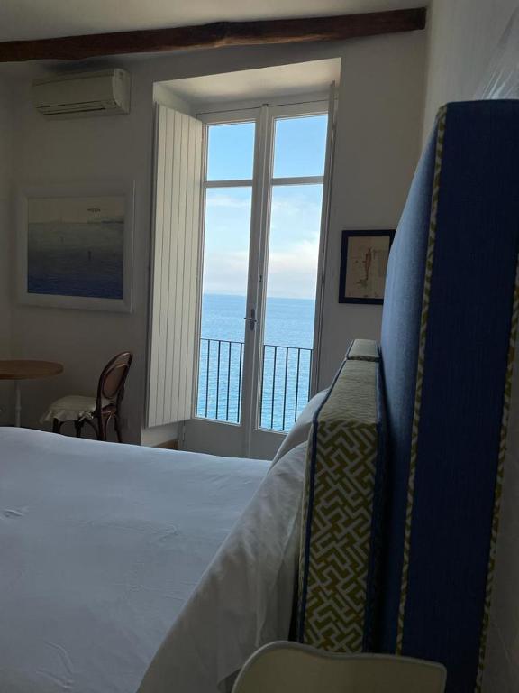 Postel nebo postele na pokoji v ubytování Casa a Mare
