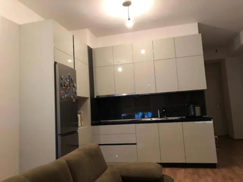 Kuchyň nebo kuchyňský kout v ubytování Modern apartment in Tirana