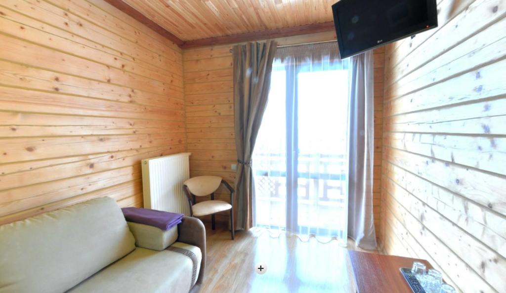 TV a/nebo společenská místnost v ubytování Hotel Forward Pool&Sauna