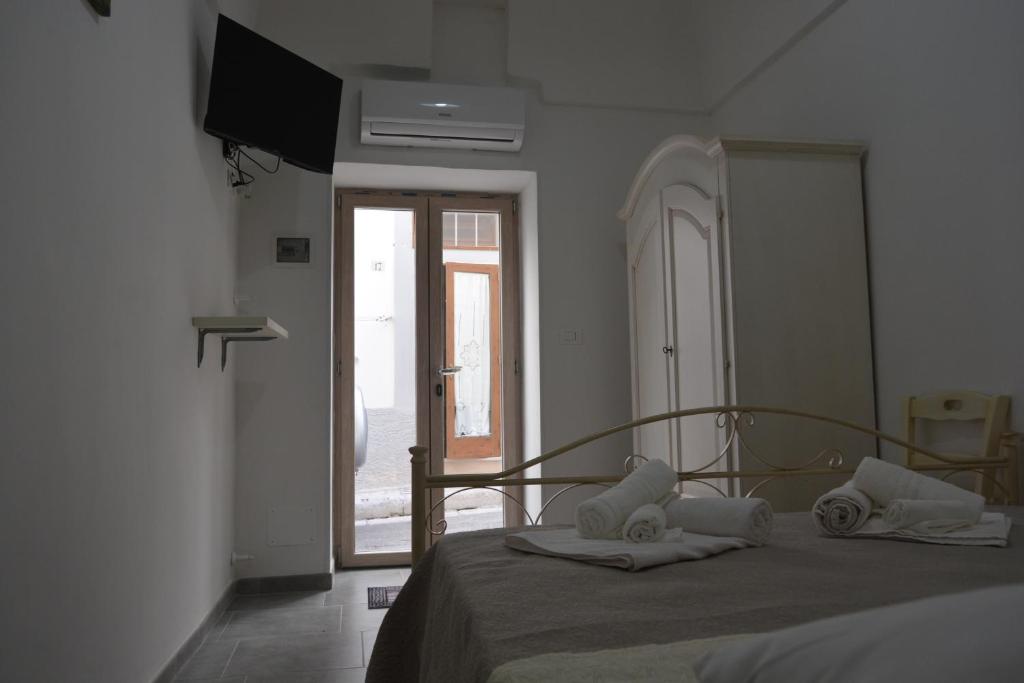 Postel nebo postele na pokoji v ubytování A Casa di Giò