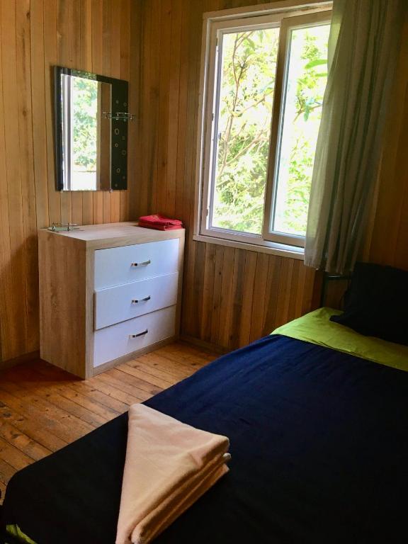 Postel nebo postele na pokoji v ubytování Houses in Gonio-Kvariati economy class