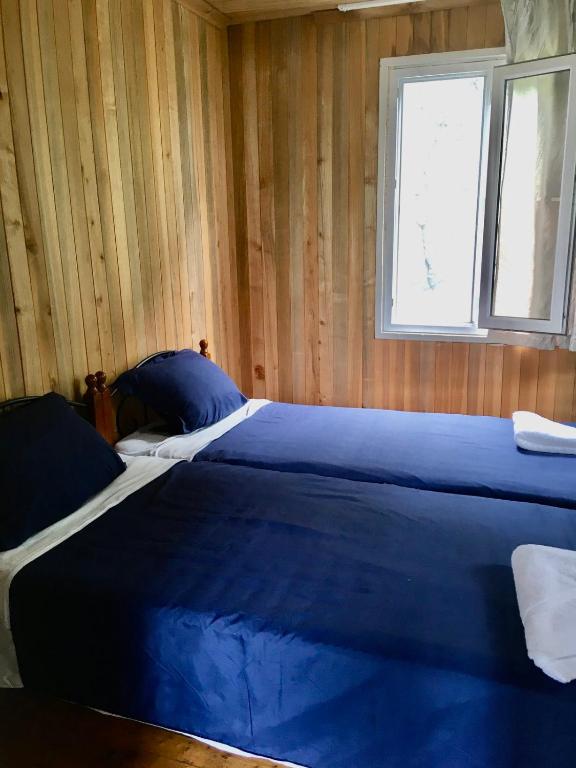 Postel nebo postele na pokoji v ubytování Houses in Gonio-Kvariati economy class