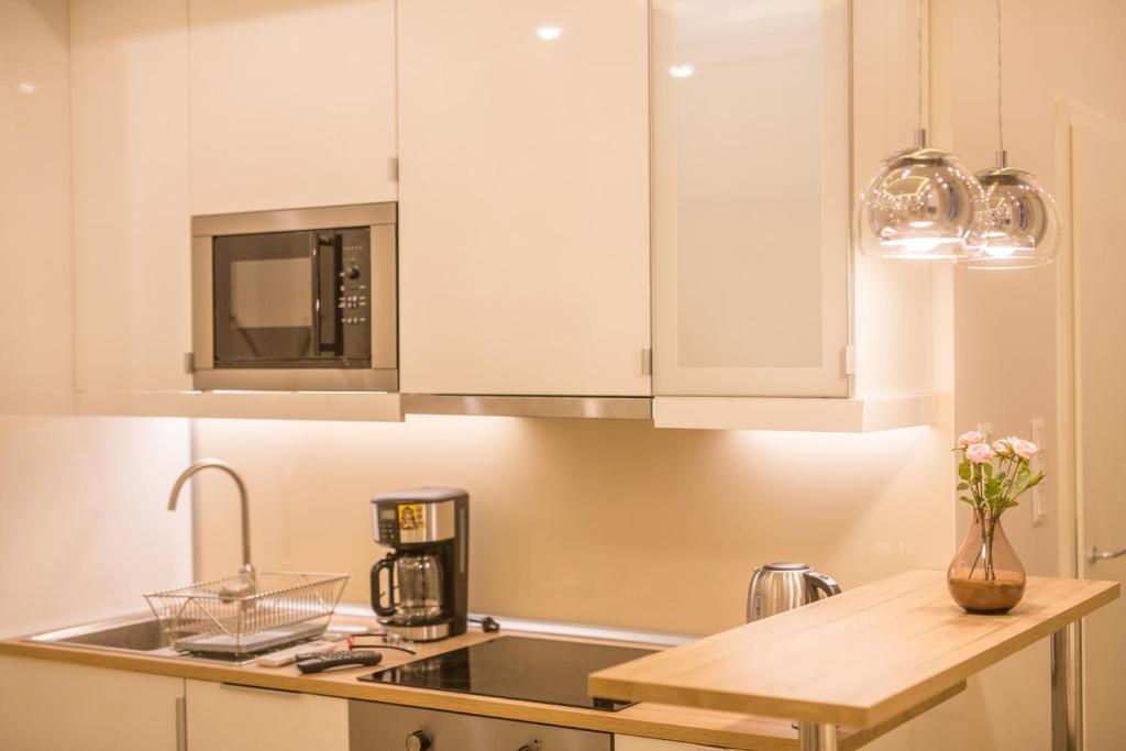 Kuchyň nebo kuchyňský kout v ubytování PANNI Stylish two bedroom flat by Andrássy Street