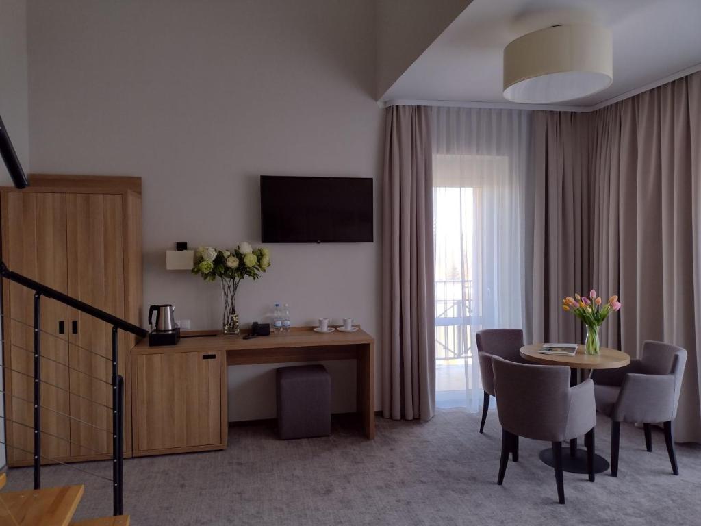 TV a/nebo společenská místnost v ubytování Hotel ***NAT Sarbinowo