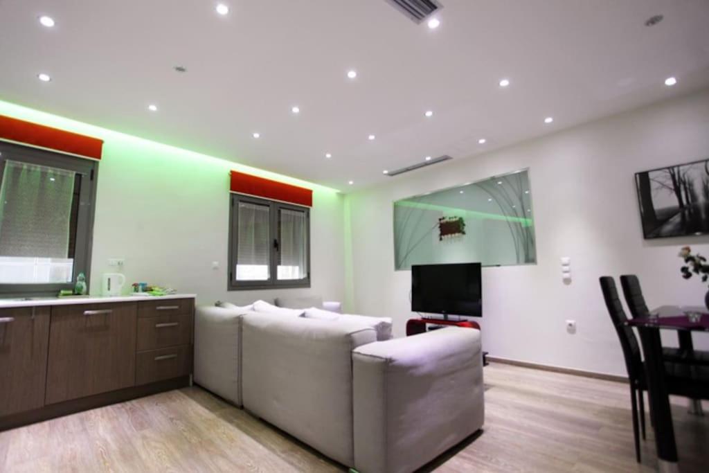Televízia a/alebo spoločenská miestnosť v ubytovaní Olvias Apartment