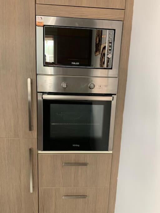 Kuchyňa alebo kuchynka v ubytovaní Olvias Apartment