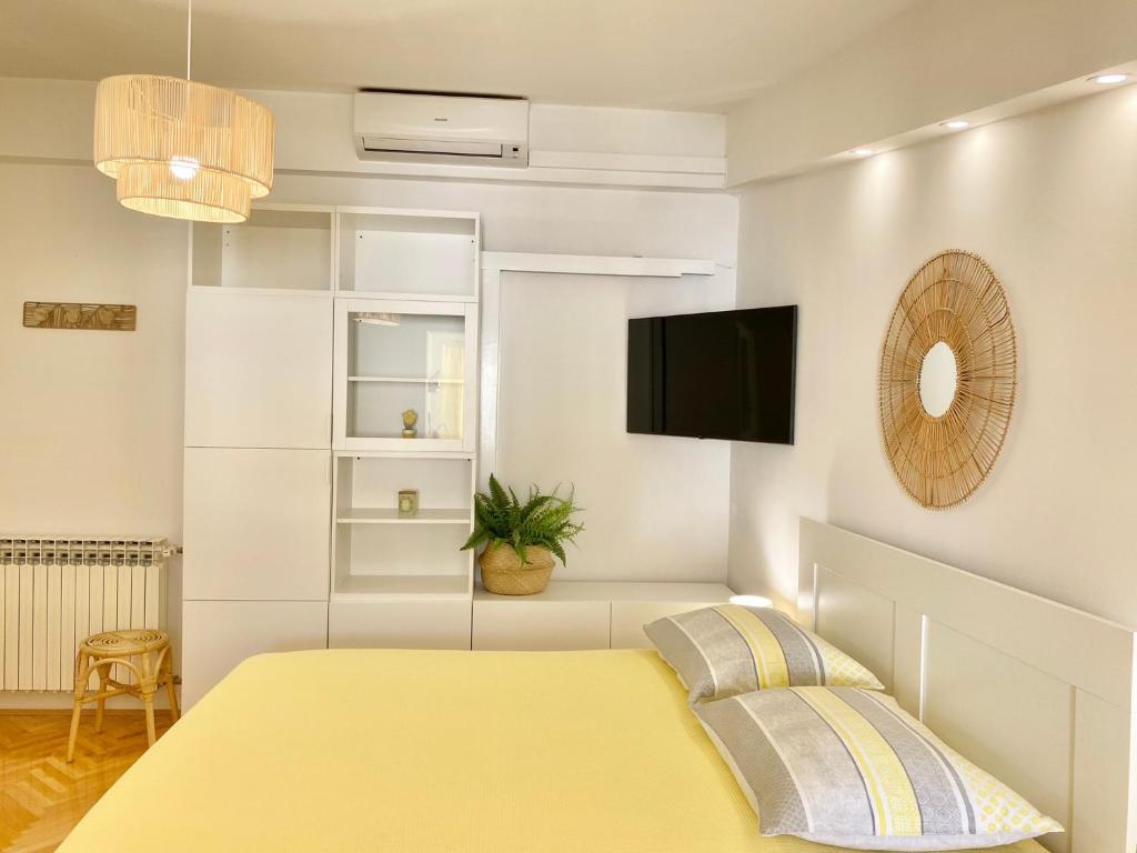 Postel nebo postele na pokoji v ubytování Apartmani Marko