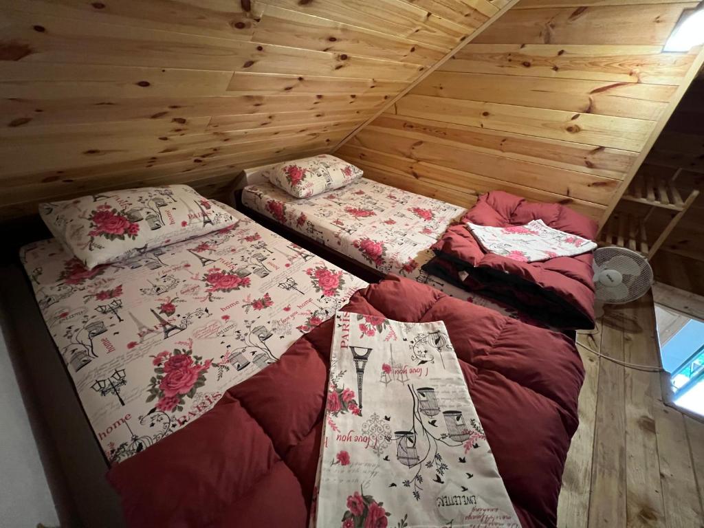 Postelja oz. postelje v sobi nastanitve Dormire Apartmans