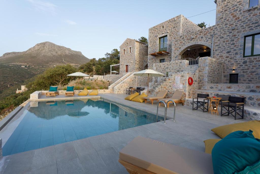 Bazén v ubytování POSEIDON-APEA Villas nebo v jeho okolí