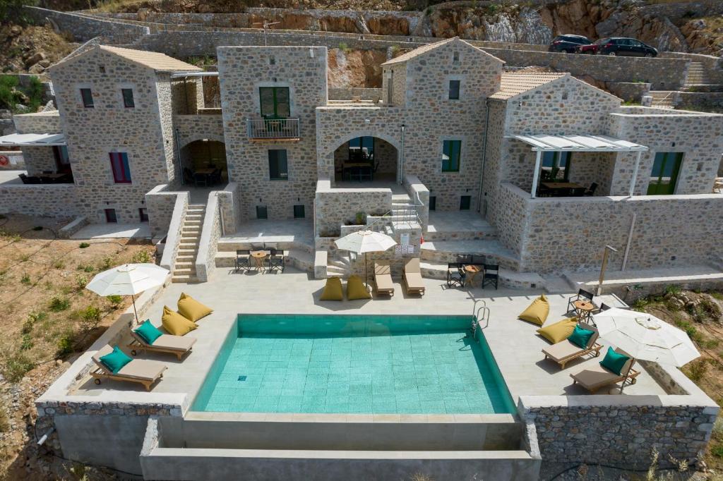 Bazén v ubytování POSEIDON-APEA Villas nebo v jeho okolí