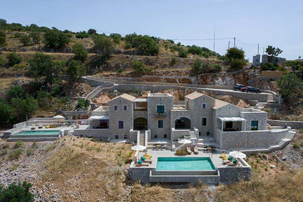 Bazén v ubytování POSEIDON-APEA Villas nebo v jeho okolí