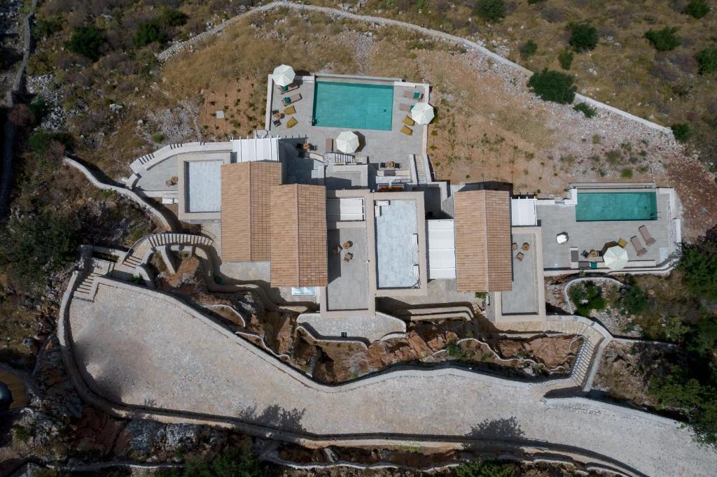 Bazén v ubytování POSEIDON-APEA Villas nebo v jeho okolí