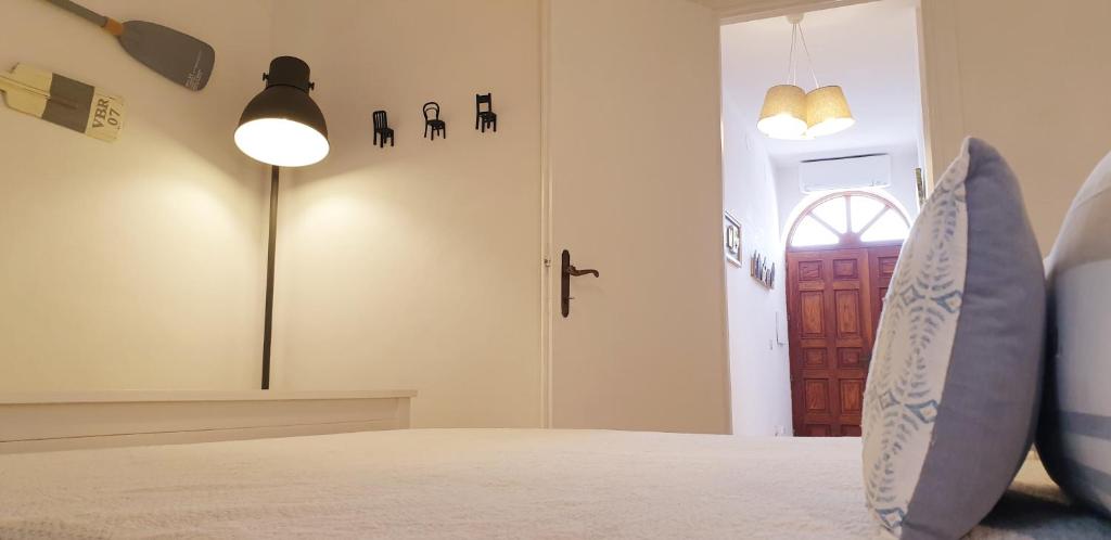 Postel nebo postele na pokoji v ubytování La casa Rosa