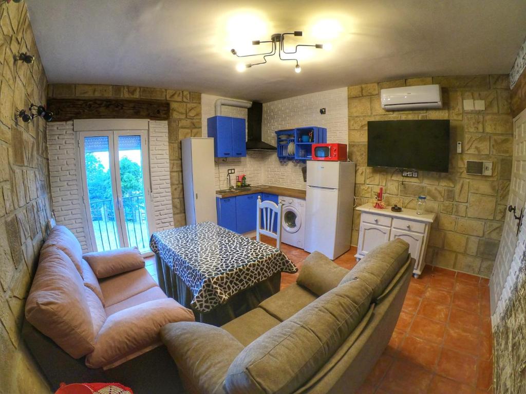 Televízia a/alebo spoločenská miestnosť v ubytovaní Cazorla Paraíso Resort