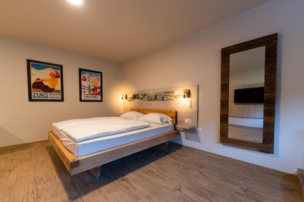 Letto o letti in una camera di Hotel Arena Maribor