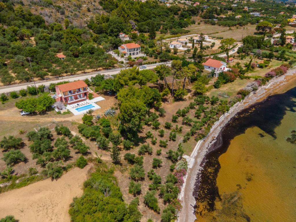 an aerial view of a house on the beach at Villa Ostria in Lixouri