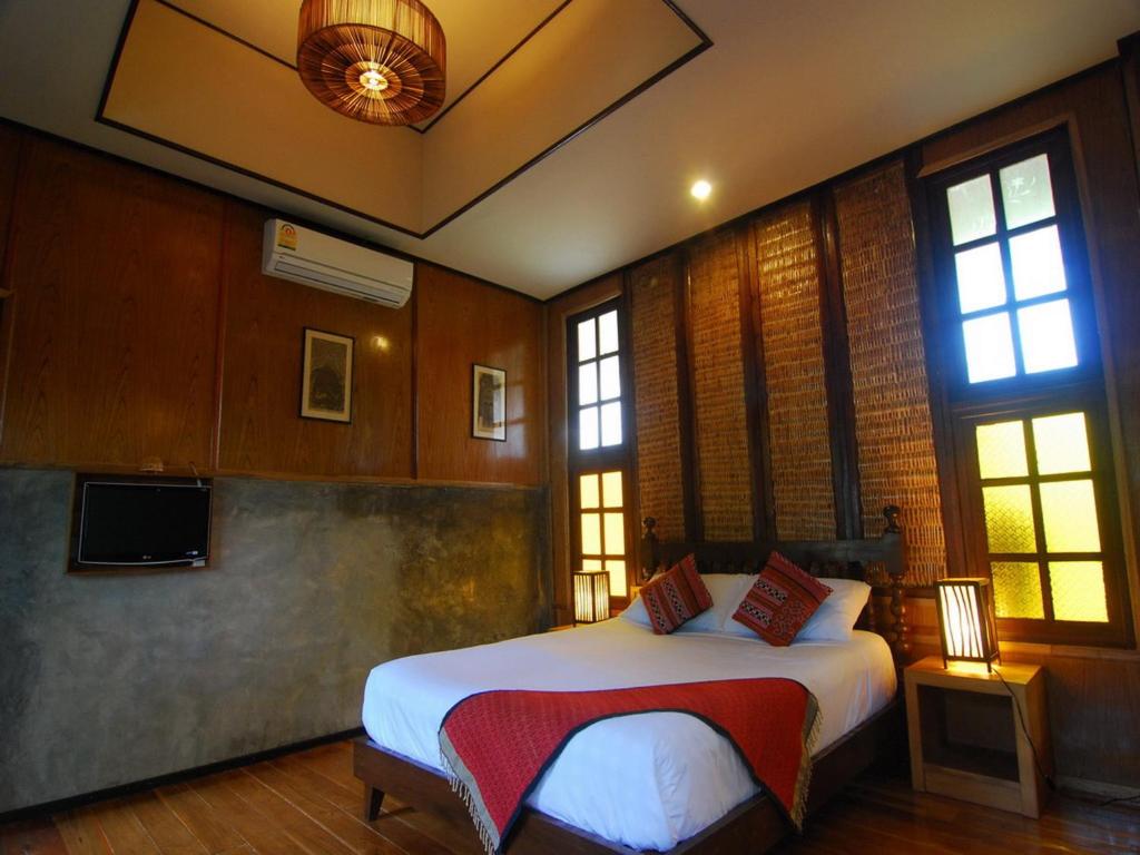 Postel nebo postele na pokoji v ubytování Baantawan Guesthouse Pai