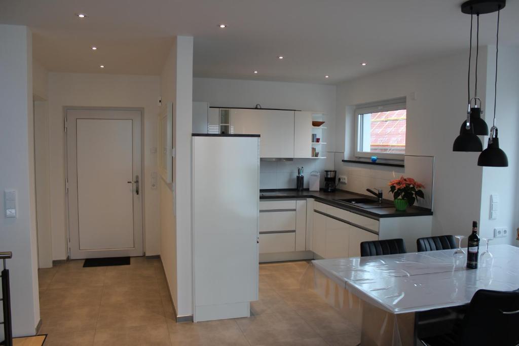 Kuchyň nebo kuchyňský kout v ubytování Ferienhaus Yuna