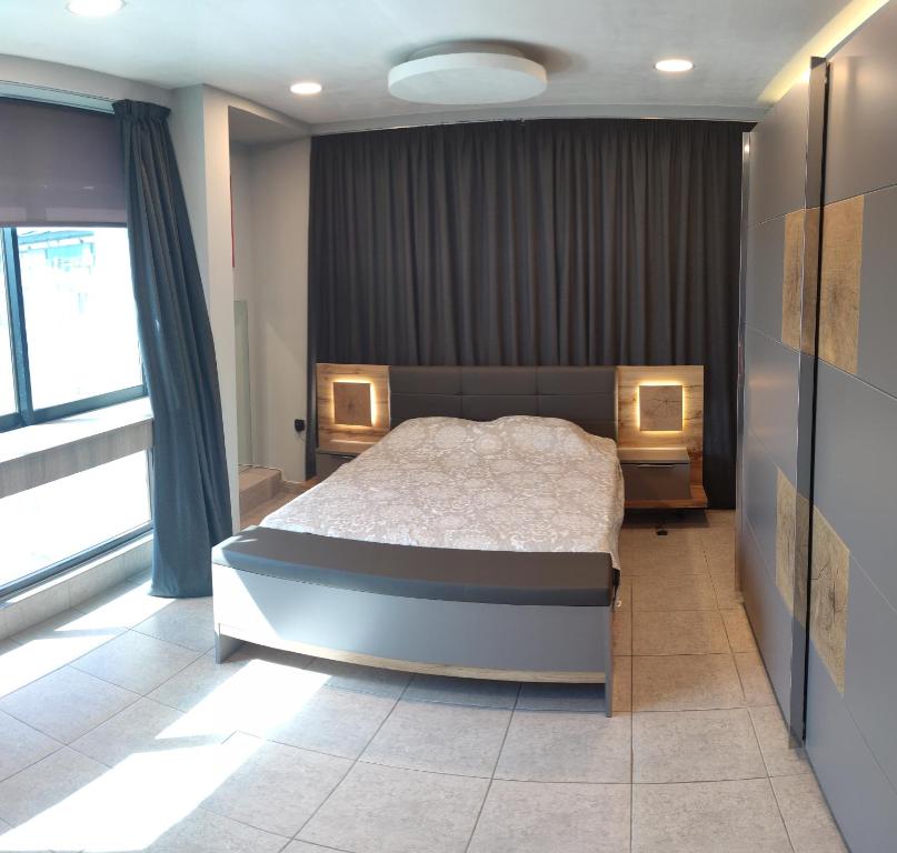 Posteľ alebo postele v izbe v ubytovaní Pegasus apartment