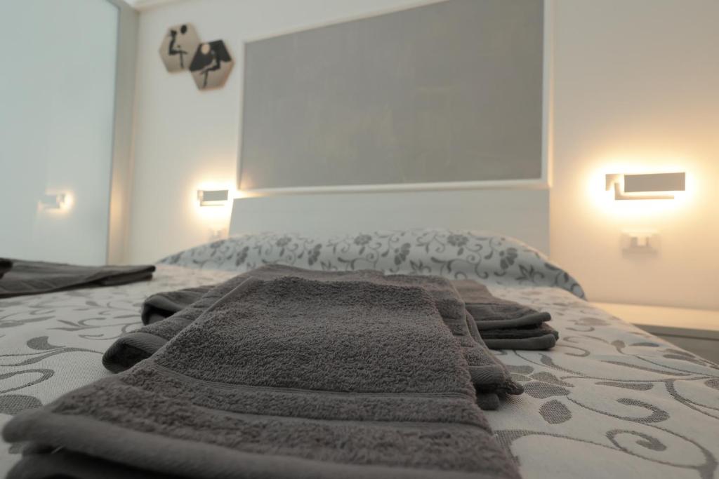 Łóżko lub łóżka w pokoju w obiekcie Othalan B&B