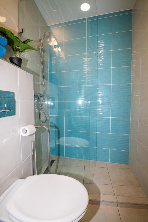 Koupelna v ubytování Palms Apartments Budapest