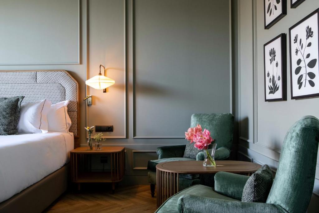 Cama o camas de una habitación en CoolRooms Palacio de Luces