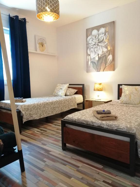 Postel nebo postele na pokoji v ubytování Apartment Rita
