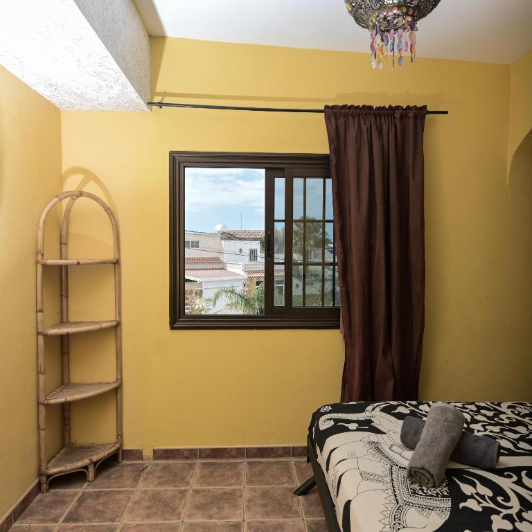 Postel nebo postele na pokoji v ubytování Los Amigos Nest Hostel