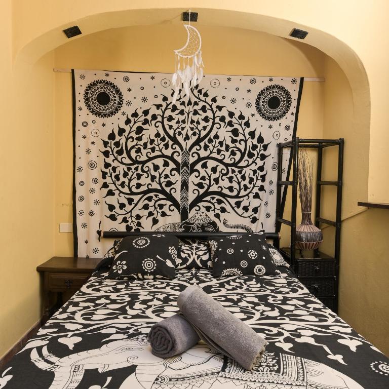 Postel nebo postele na pokoji v ubytování Los Amigos Nest Hostel